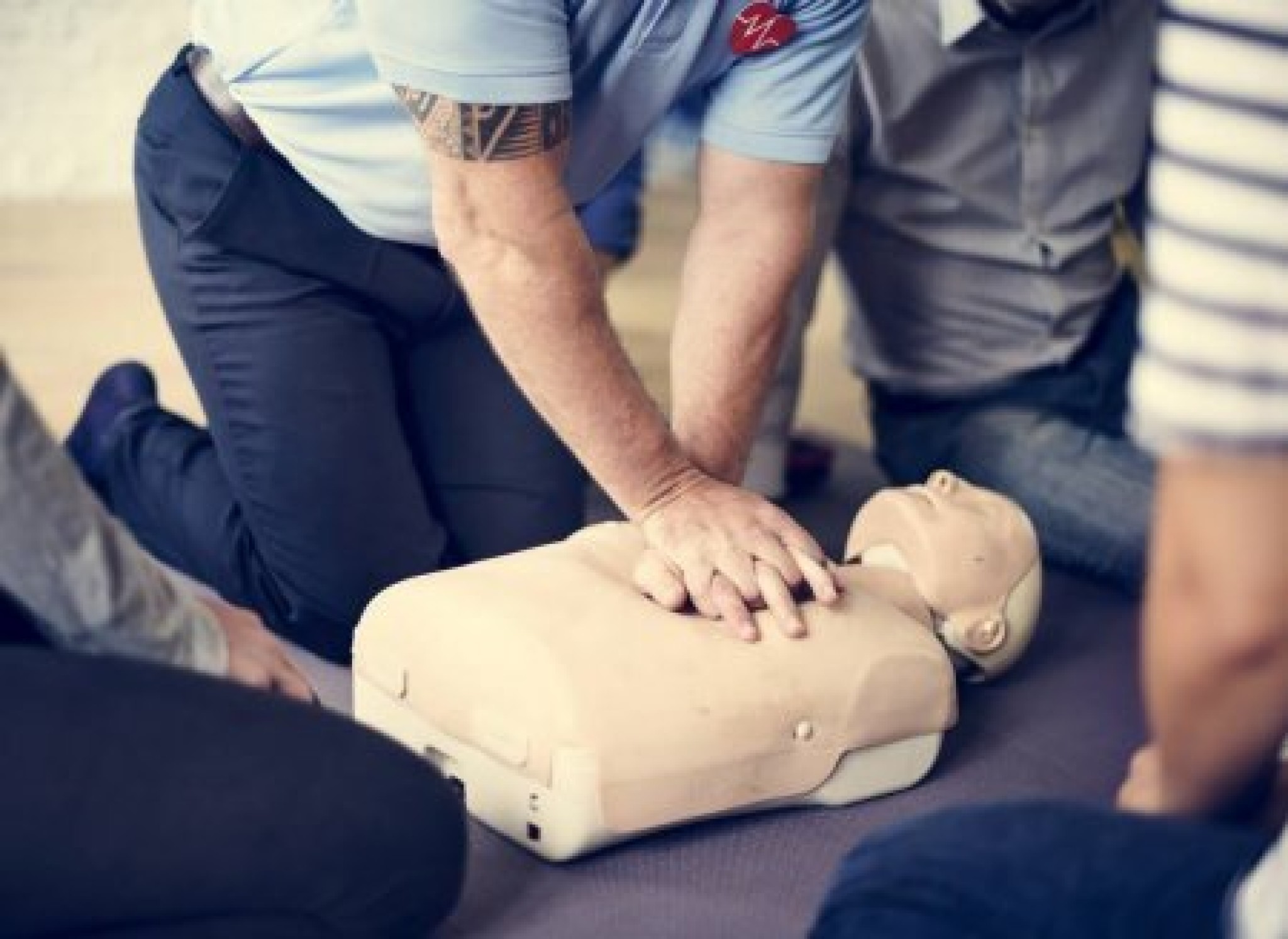 depositphotos_137514770-stock-photo-people-learning-cpr-first-aid.jpg